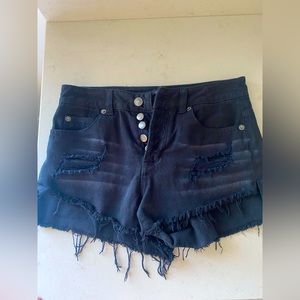 Black distressed cutoff shorts